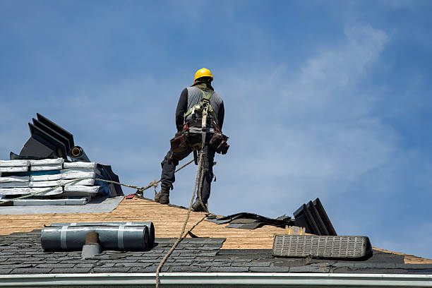Professional Gutter Installation technician working in Miles, IA